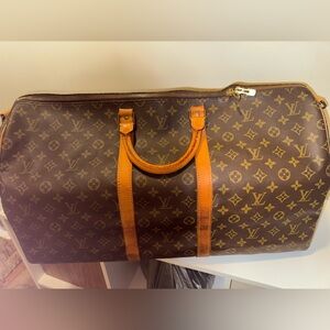 Louis Vuitton Keepall 55 Bandolier in monogram coated canvas